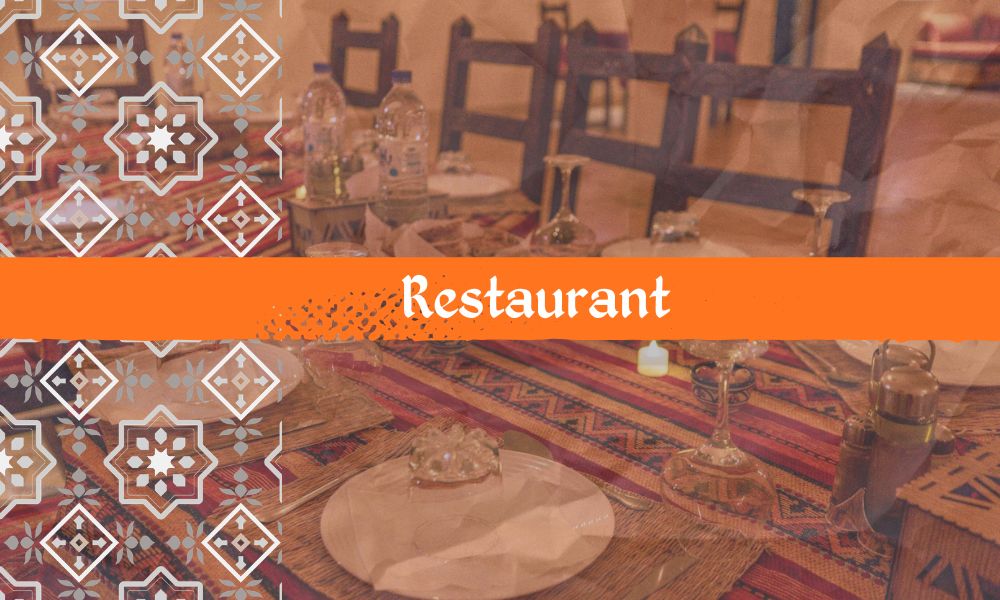 Restaurant au Cœur du Désert d’Ouzina | Savourez une cuisine marocaine authentique, des plats traditionnels et une expérience dans le désert.